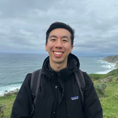 Alex Quach standing on a coastal trail